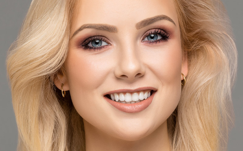 Beautiful model with permanent makeup eyebrows